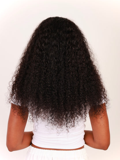 Shows thickness and length of deep curly bundles and how it blends with natural hair